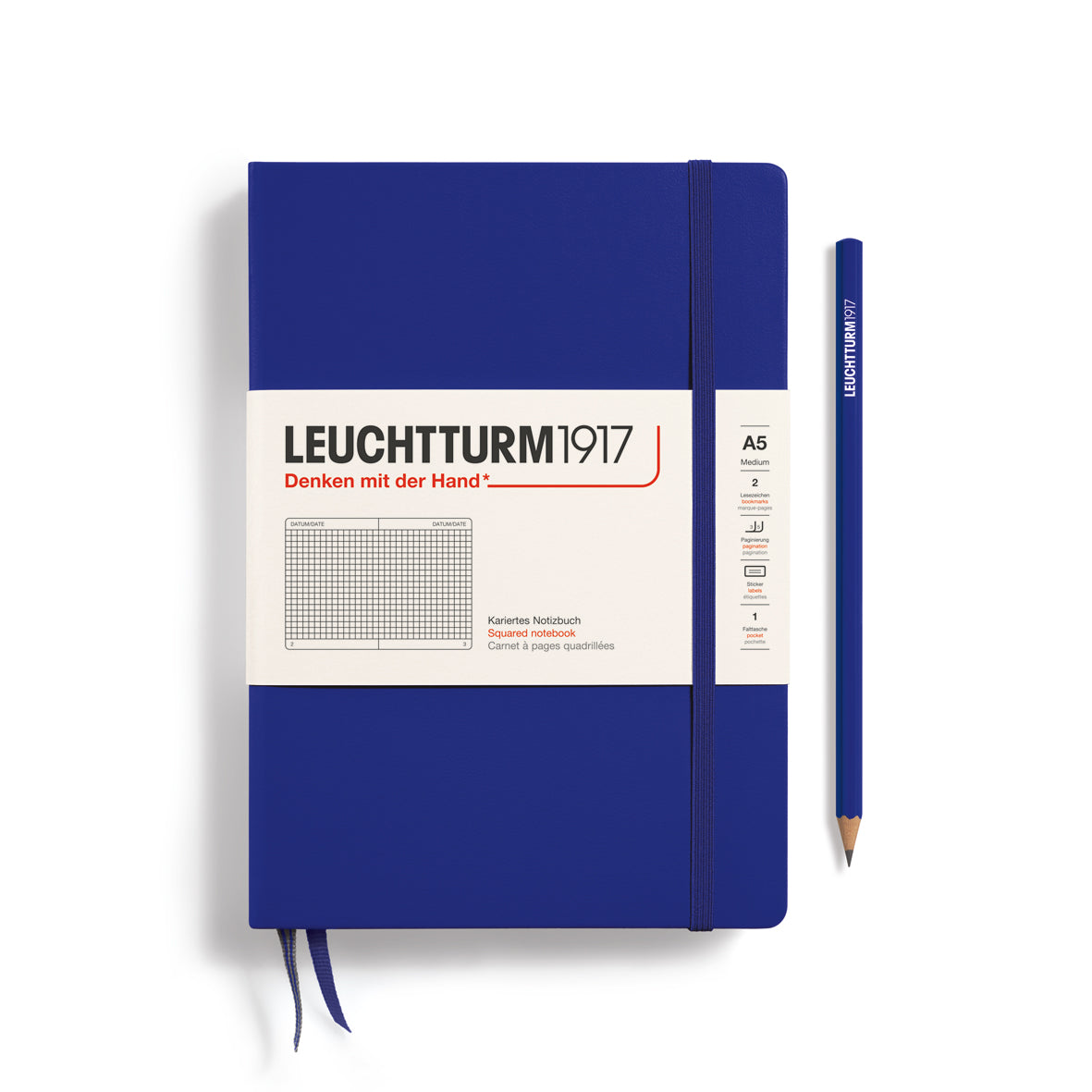 Blue notebook with a pencil on a white background, featuring Leuchtturm1917 branding.