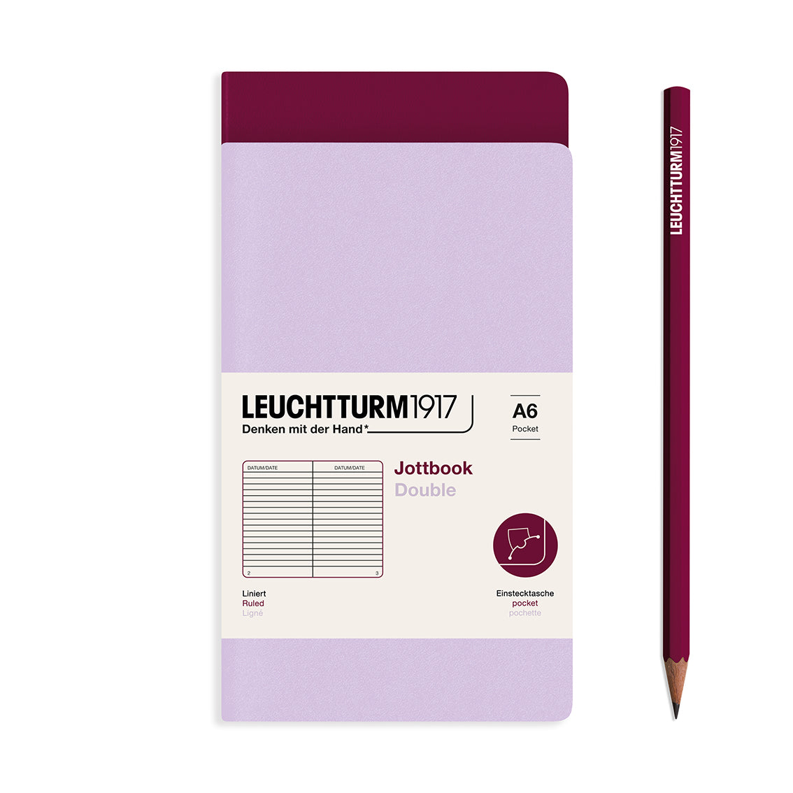 Leuchtturm1917 notebook and pencil on a white background