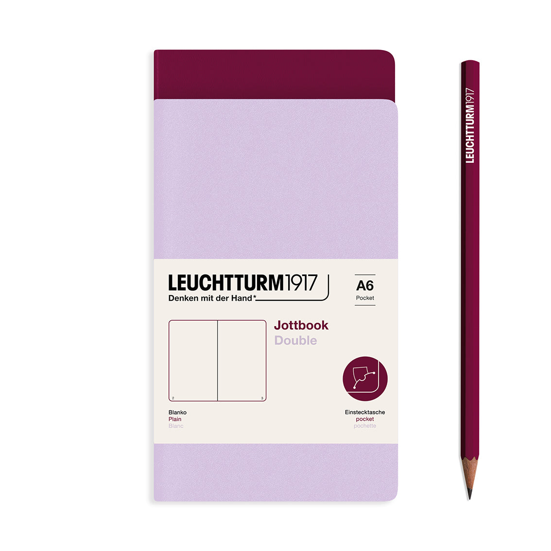Leuchtturm1917 notebook and pencil on a white background