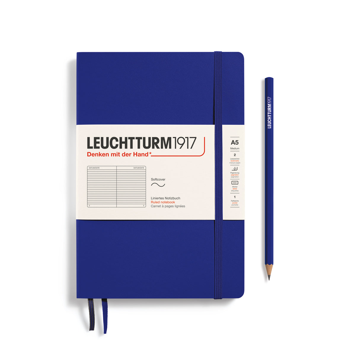 Blue notebook with white label and pencil on a white background, featuring Leuchtturm1917 branding.