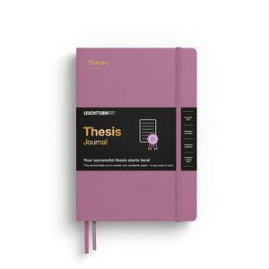 Purple thesis journal with black label on a white background