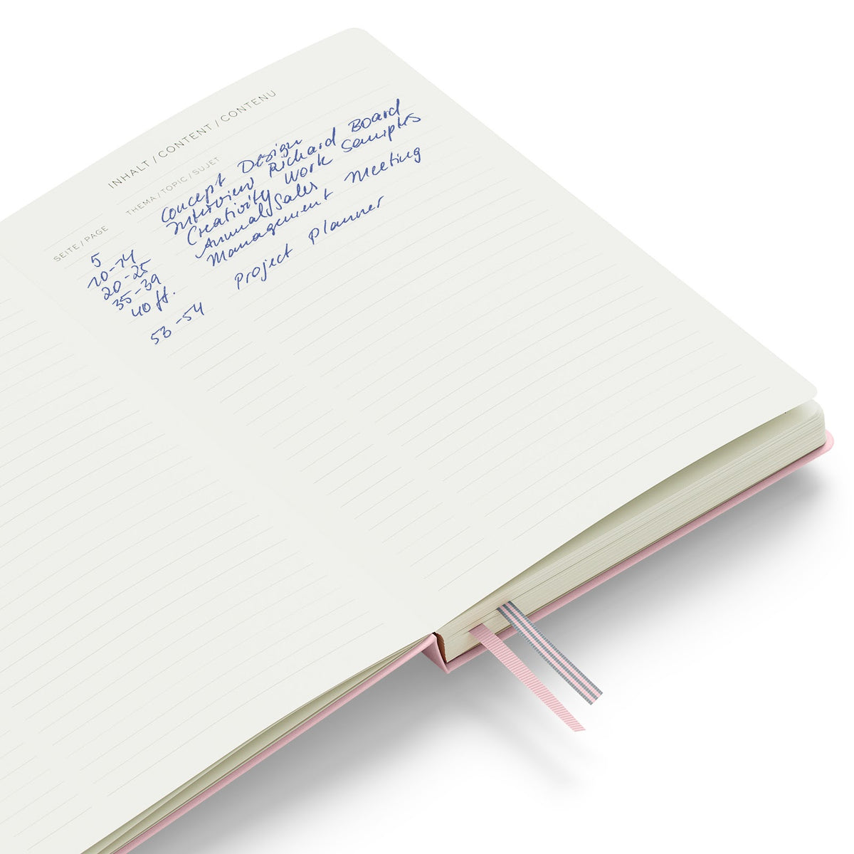 Notebook with handwritten text on a white background