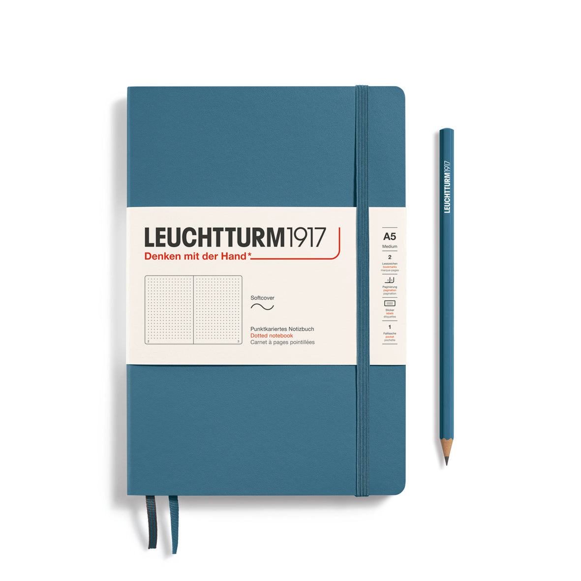 Blue notebook with white label and pencil on a white background, featuring Leuchtturm1917 branding.