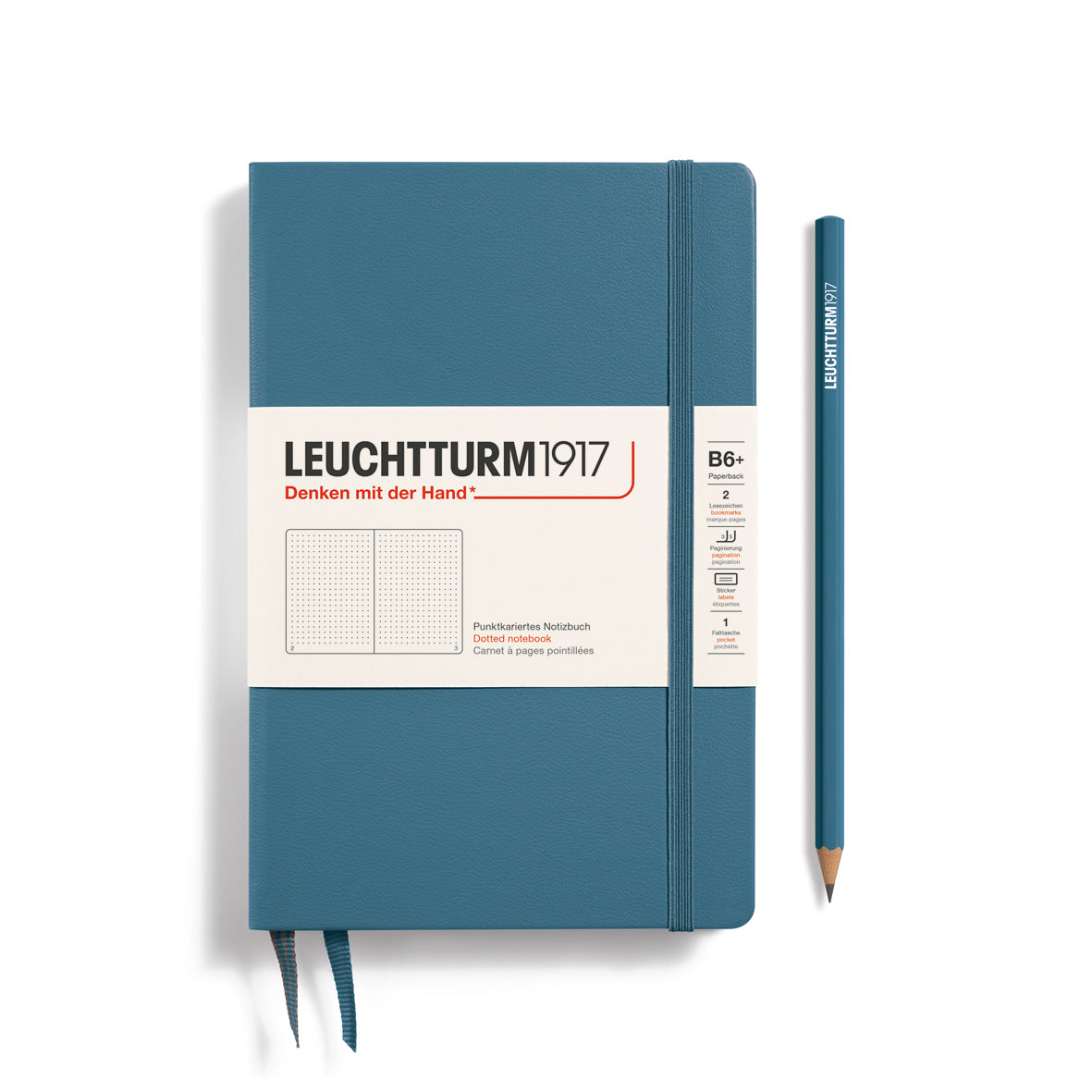 Blue notebook with white label and pencil on a white background, featuring Leuchtturm1917 branding.