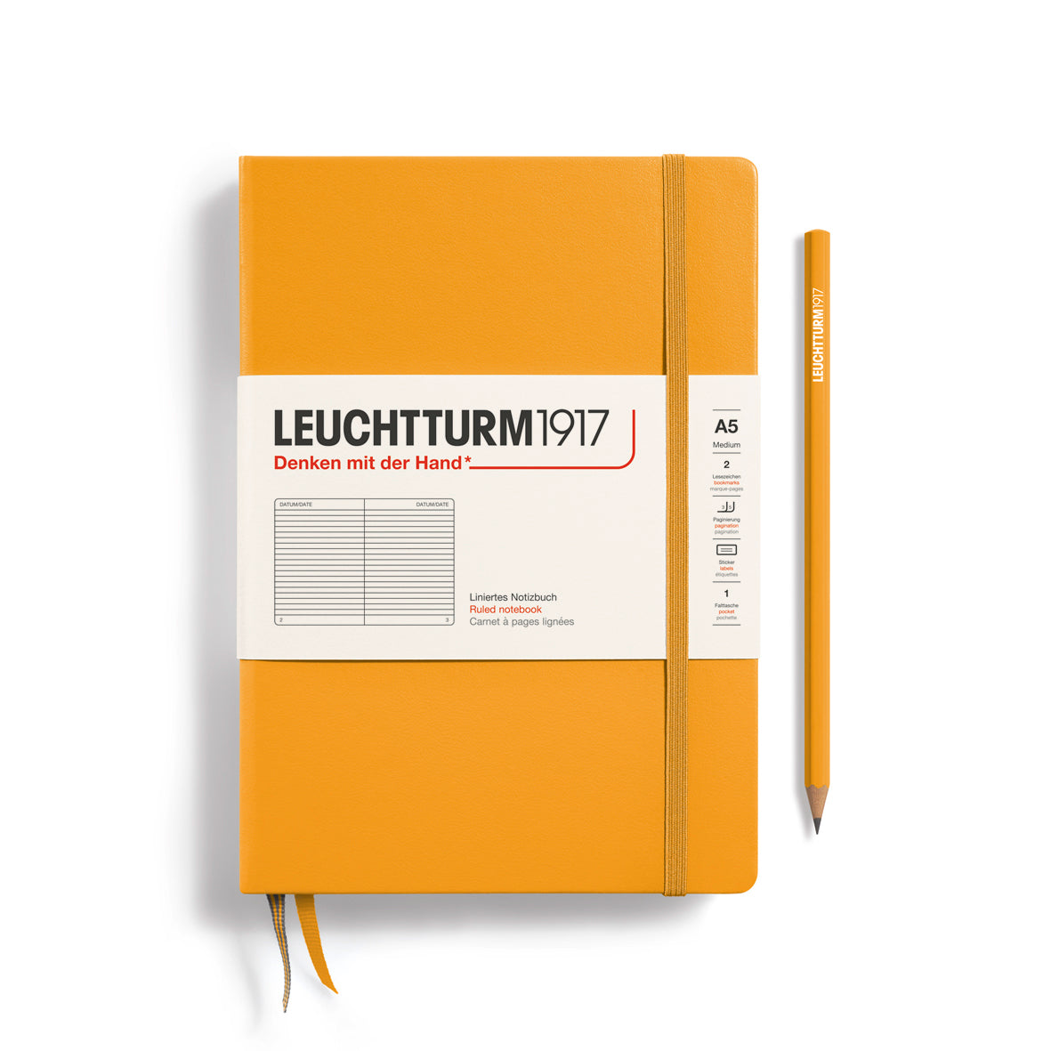 Orange notebook with a pen on a white background, featuring Leuchtturm1917 branding.