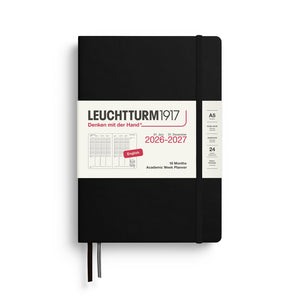 Leuchtturm1917 planner with black cover and white front cover displaying text and graphics.