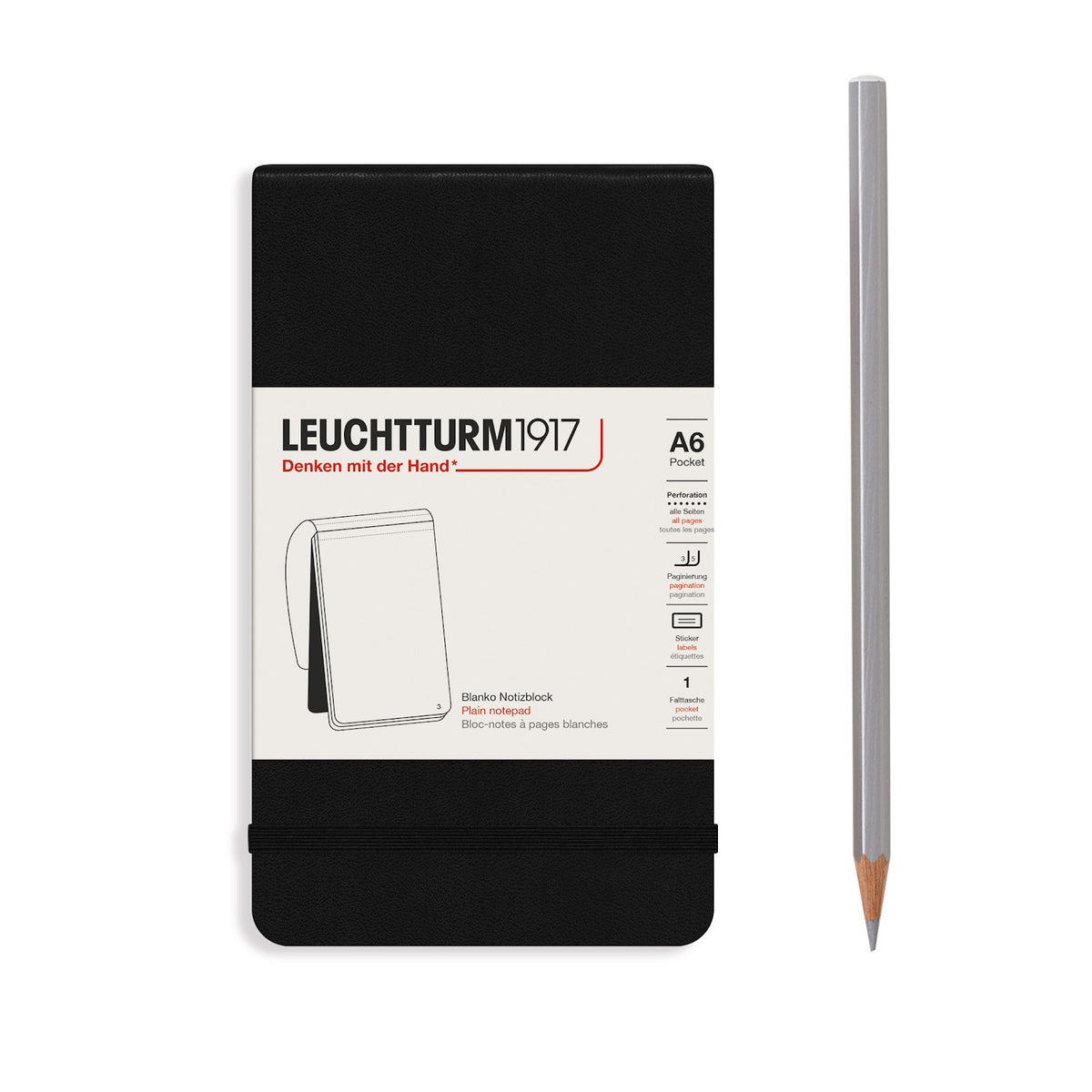 Leuchtturm1917 notebook with a black cover and a silver pencil on a white background