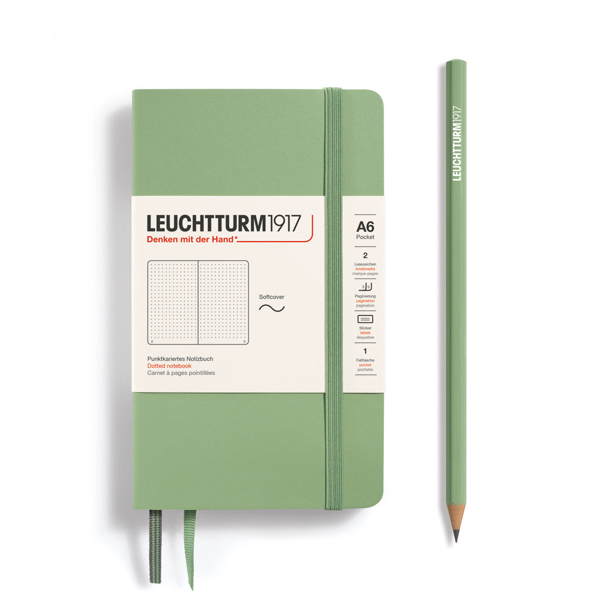 Green notebook and pencil with Leuchtturm1917 branding on a white background