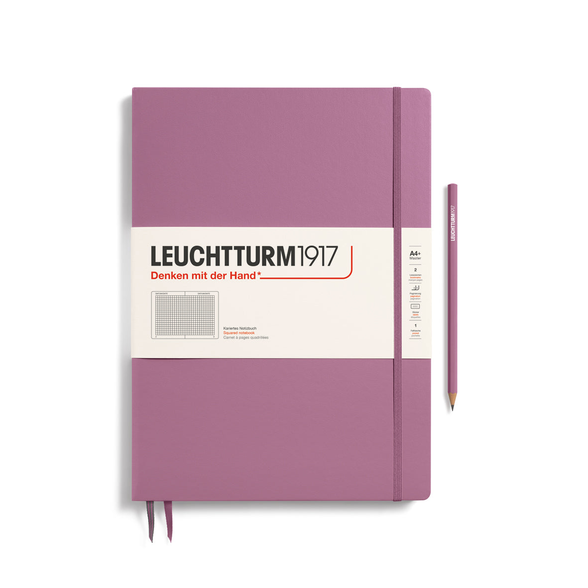 Purple notebook with a pen on a white background, featuring the Leuchtturm1917 brand.