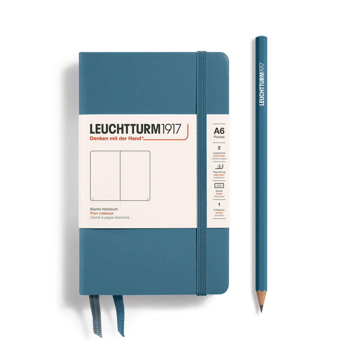 Blue notebook with a pencil on a white background, featuring Leuchtturm1917 branding.