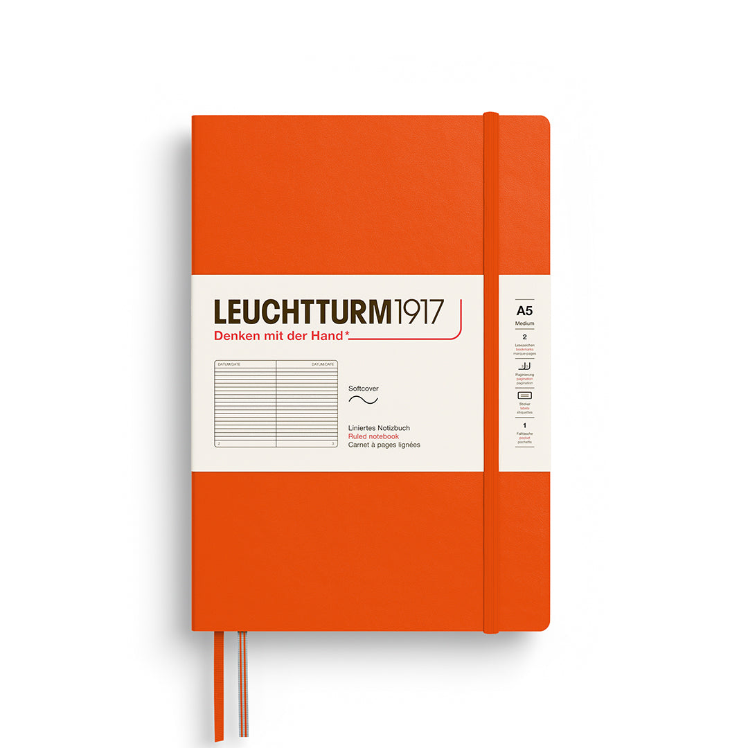 Orange notebook with white label featuring 'Leuchtturm1917' on a white background