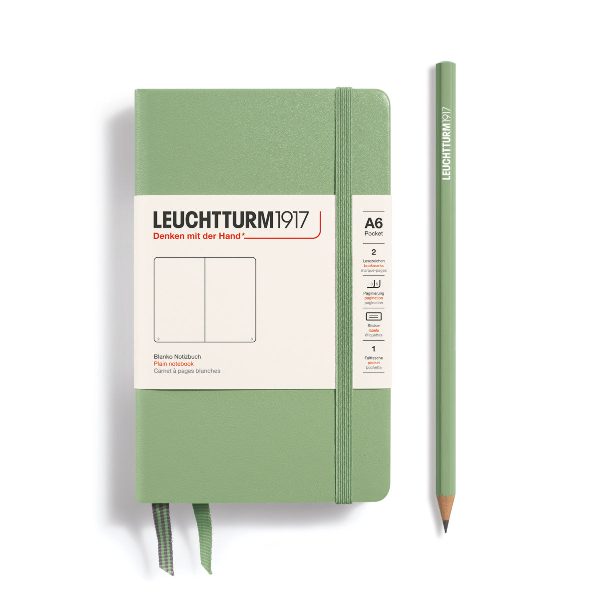 Green notebook with a pencil on a white background, featuring Leuchtturm1917 branding.