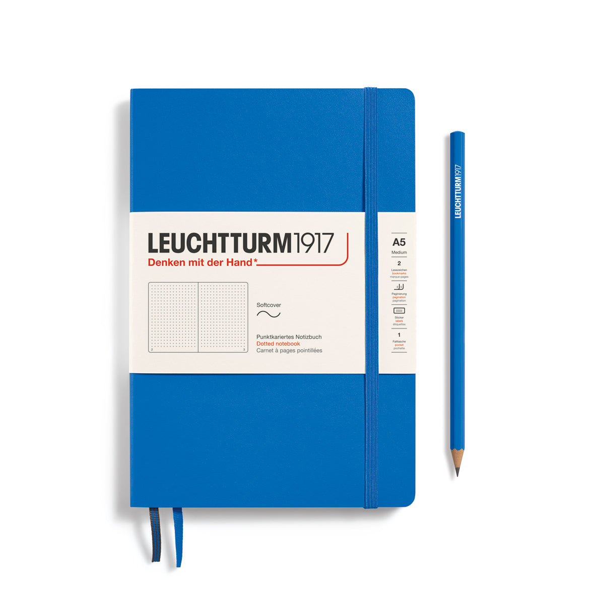 Blue notebook with Leuchtturm1917 branding and a pencil on a white background