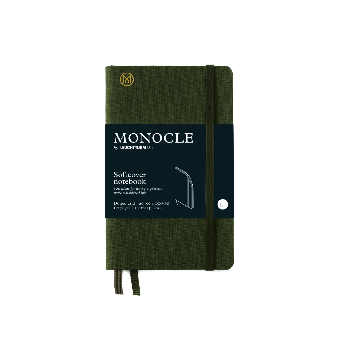 Green notebook with Monocle branding on a white background