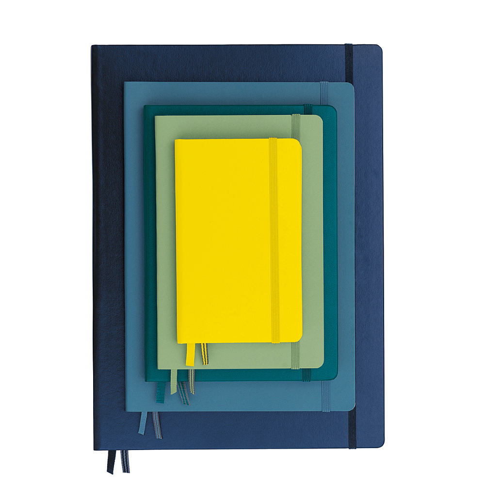 Stack of colorful notebooks with a yellow one on top