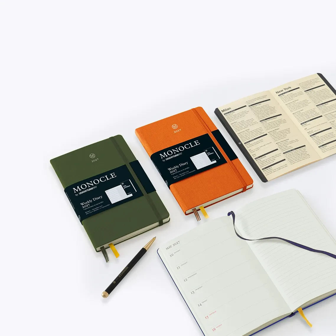 Three notebooks with 'Monocle' branding on a white background