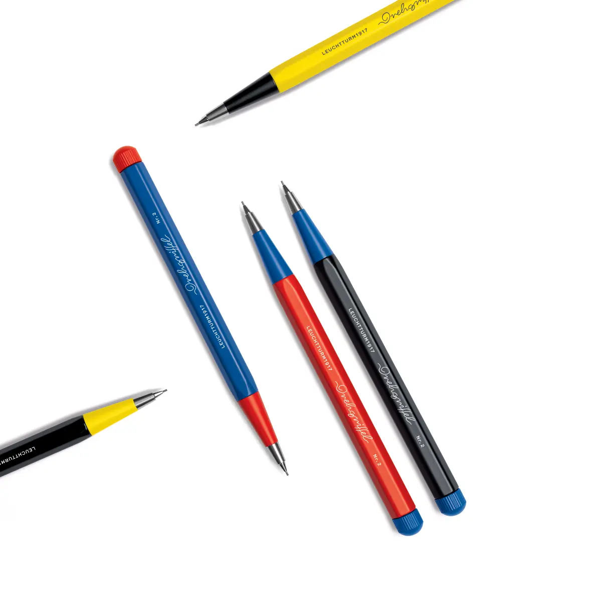 Set of mechanical pencils with blue, red, and yellow accents on a white background