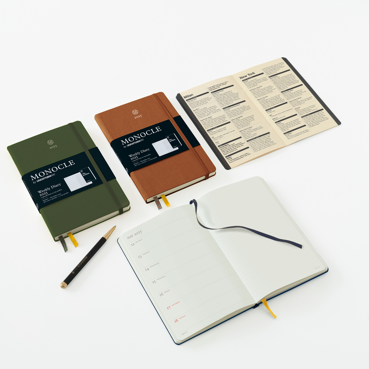 Three notebooks with different cover colors on a white background