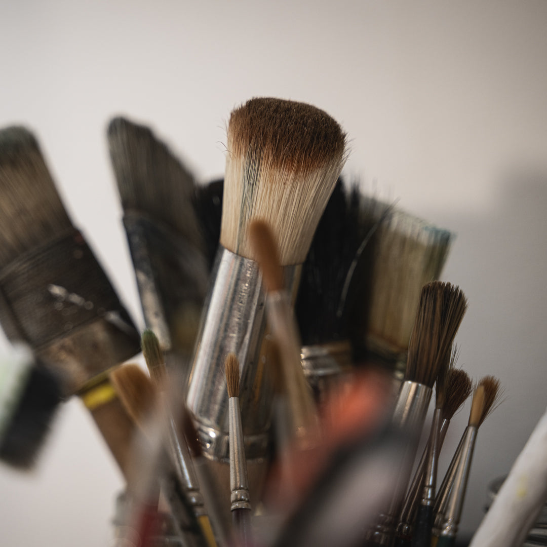 Collection of paintbrushes with a blurred background